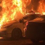Kiev, Ukraine: Anarchists burned a police car